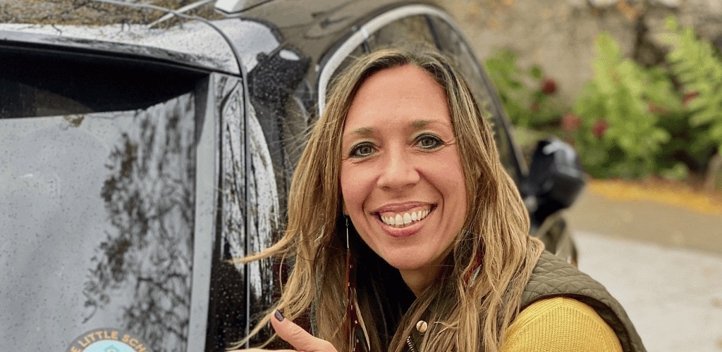 Woman next to car Gratitude